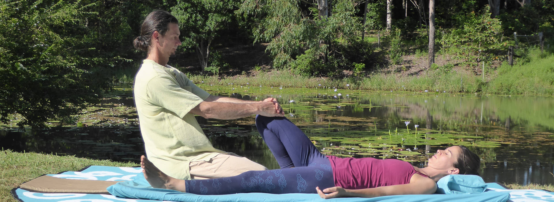 Thai yoga massage by the pond.